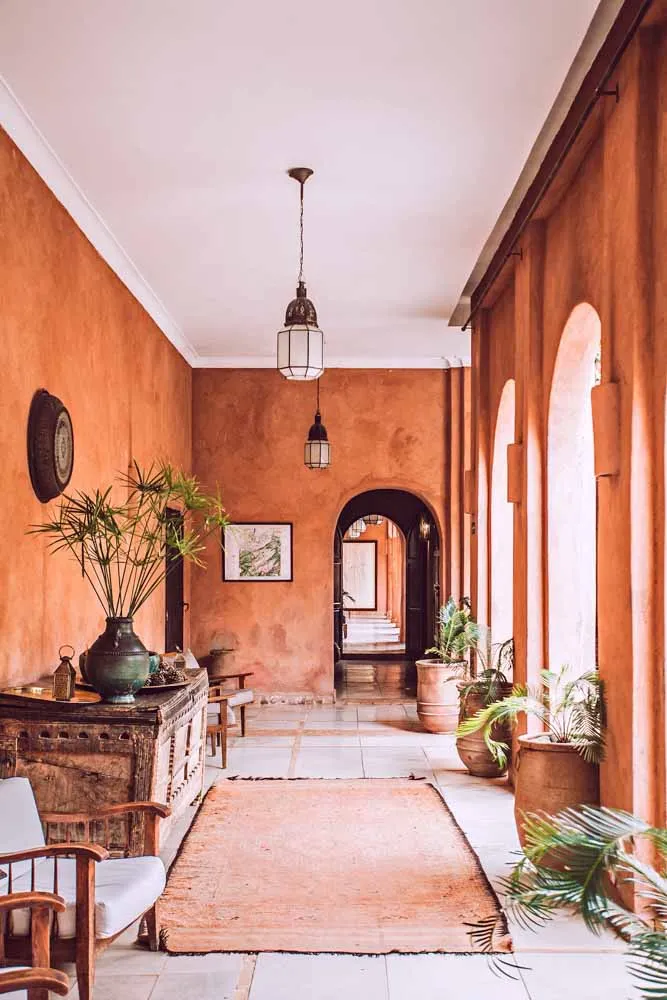 Grey hallway ceiling with brown surrounding walls