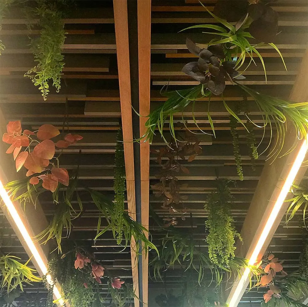 gorgeous wooden hallway ceiling designs with plants