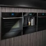 built in kitchen appliances in a brown wall