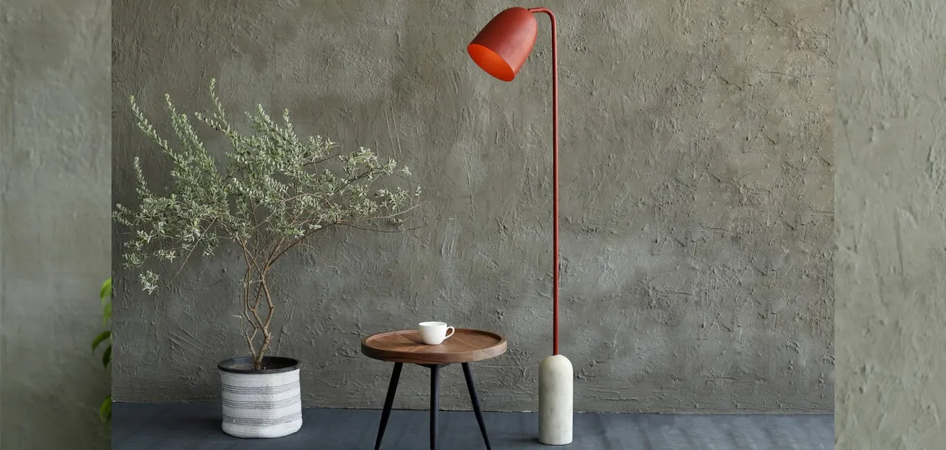 minimalist arched floor lamps, placed in a room, beside a table, indoor planter, available online in many styles