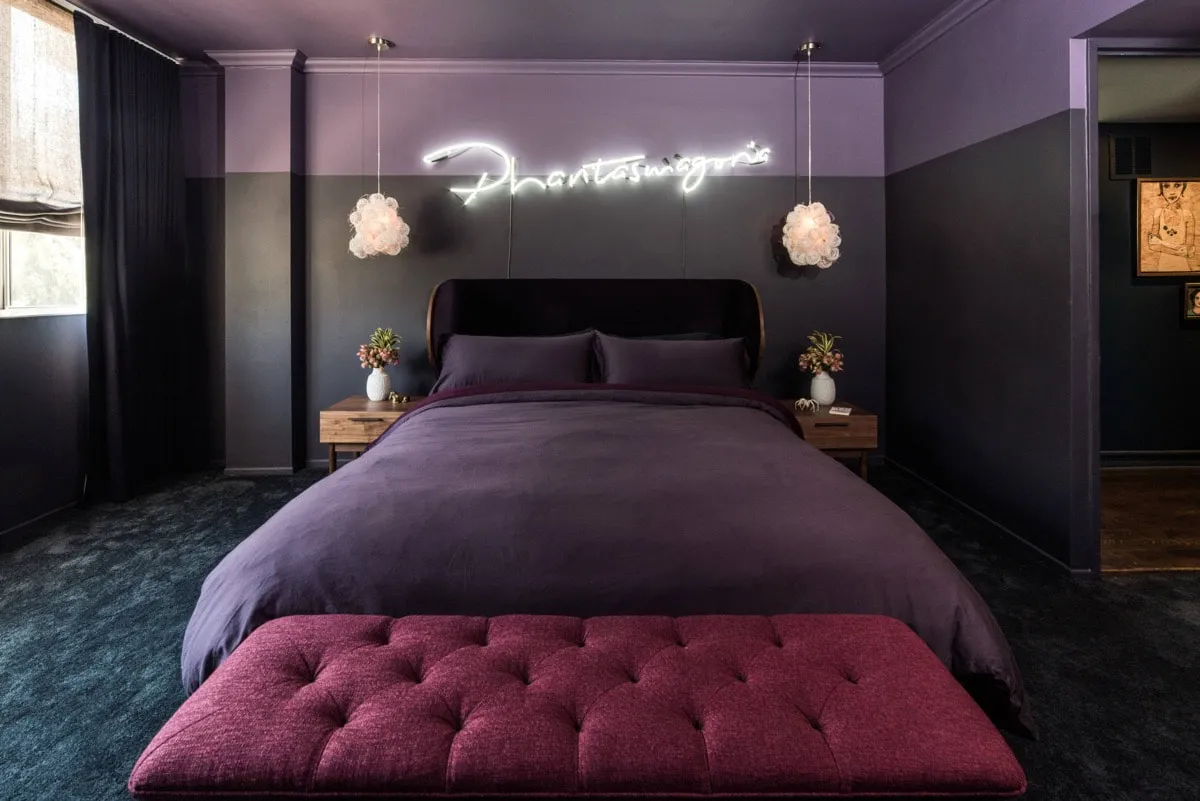 Bold black and violet shades for your room, led light on the wall, tufted bed