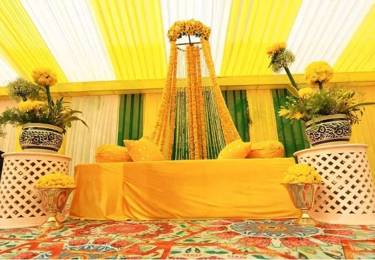 Simple floral canopy. Indoor celebration for haldi