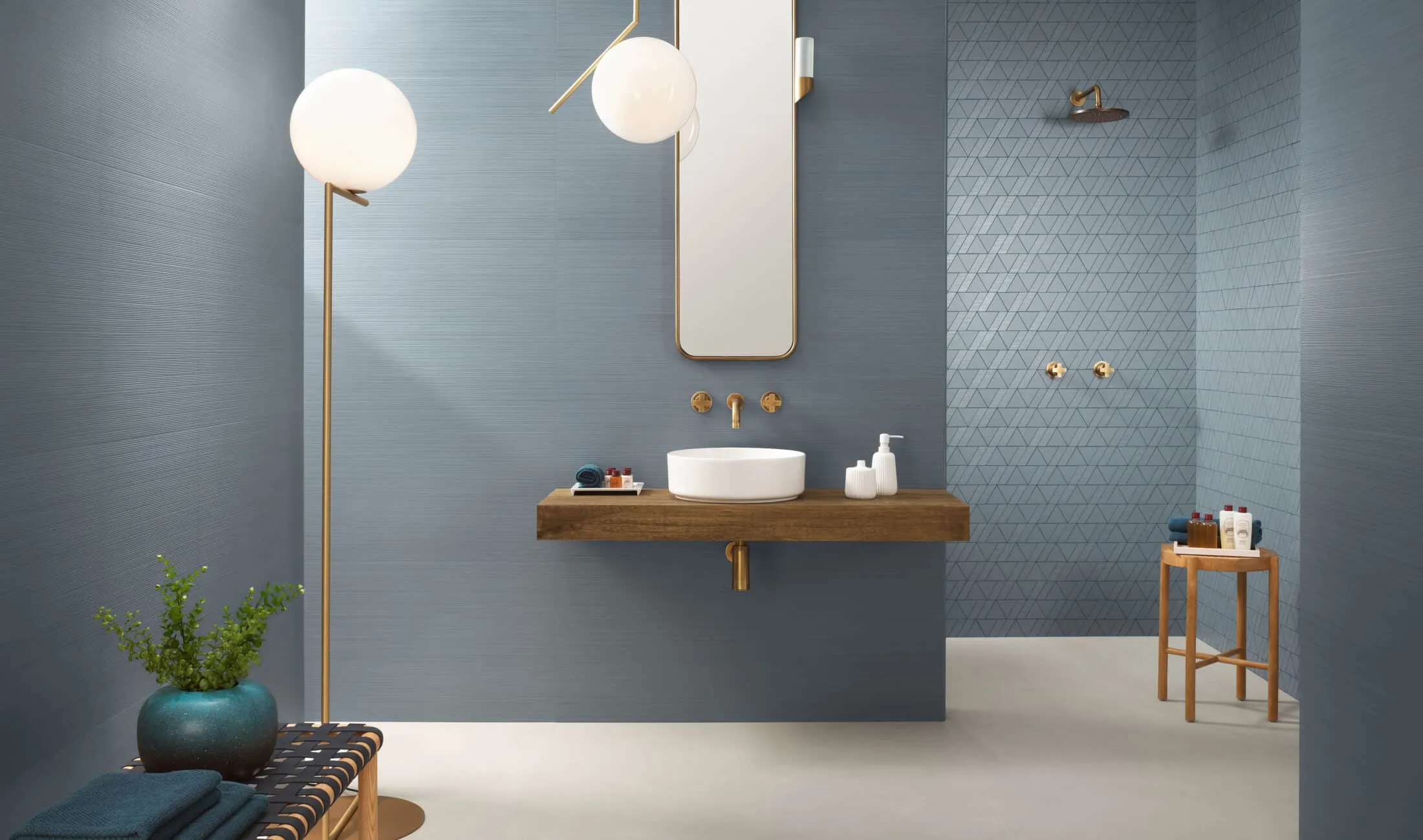 blue designer bathroom flooring tiles & tiling design with floor lamp and pendant lights
