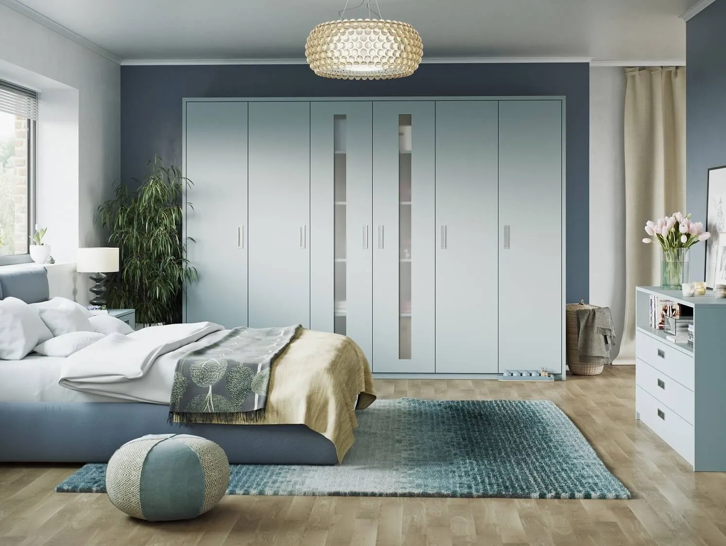 minimalist powder blue bed room with sleek platform bed, pouffe, rug, wardrobe, indoor plant, and a round ceiling light
