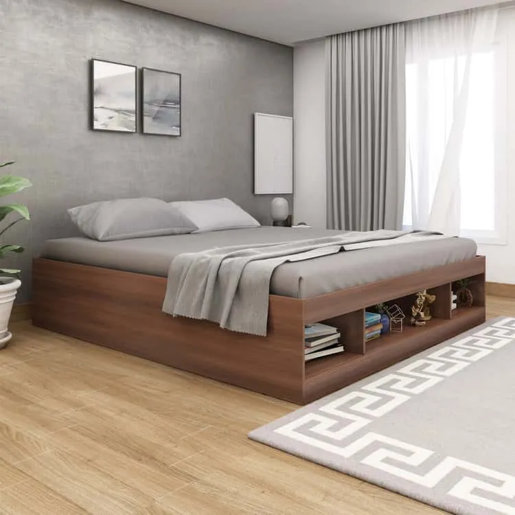 brown bed in a grey bedroom with grey rug 