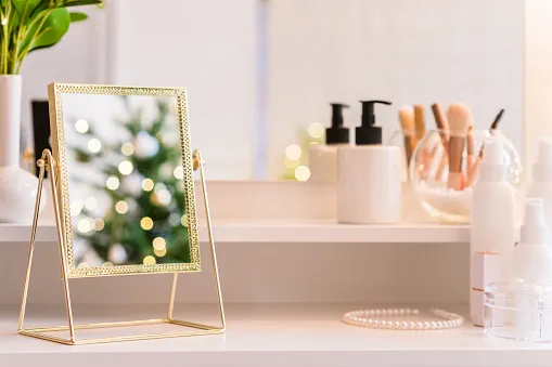 table top mirror, elegant mirror frame, placed on the dressing table, indoor plants