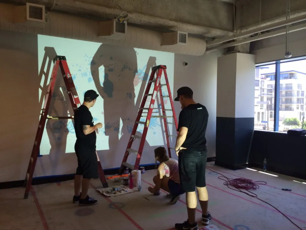transferring the image on the wall using a projector