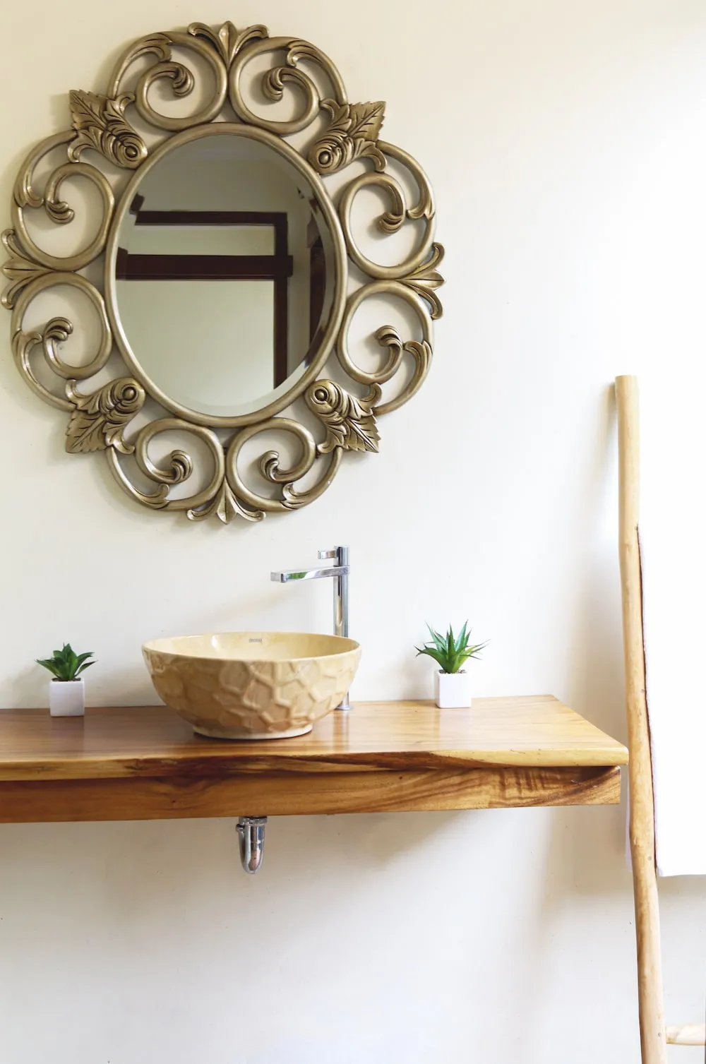 beautiful vintage decor item, golden frame, washbasin, faucet, boho-themed vanity