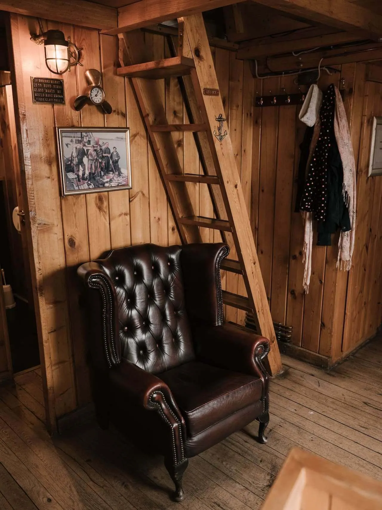 Sturdy wooden ladder stairs leading to a loft area