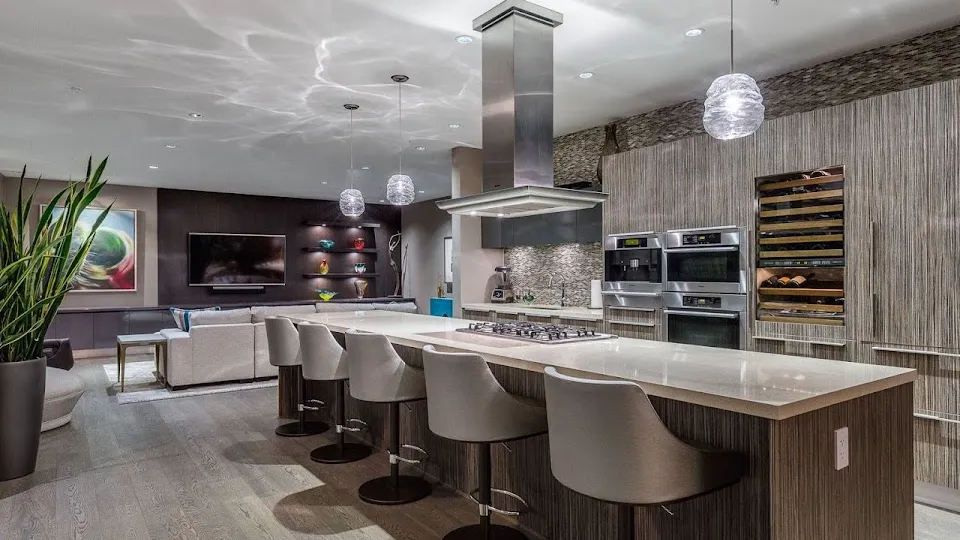 A kitchen with high end appliances, elegant luxury modern kitchen design
