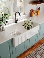 white coloured farmhouse sink design for traditionally-designed kitchens