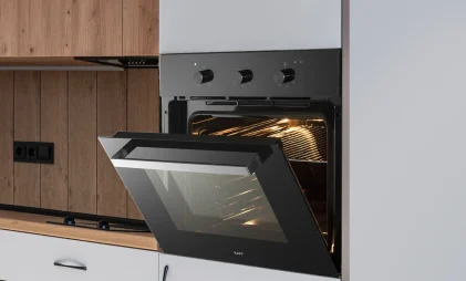 KAFF built-in kitchen appliances in a kitchen with grey cabinets