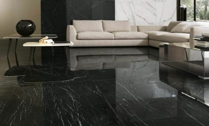 polished finish for black granite flooring with cream sofa