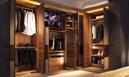 walk in wardrobe with lighting and wooden texture